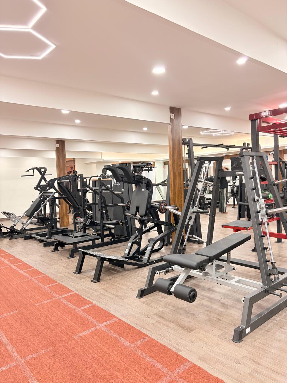 Inside Liger Fitness Vellimadukunnu - training area and premium equipment